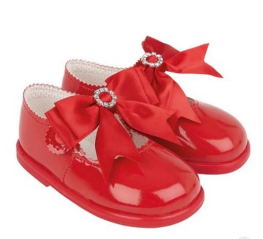 Girls diamanté bow hard sole shoes Red